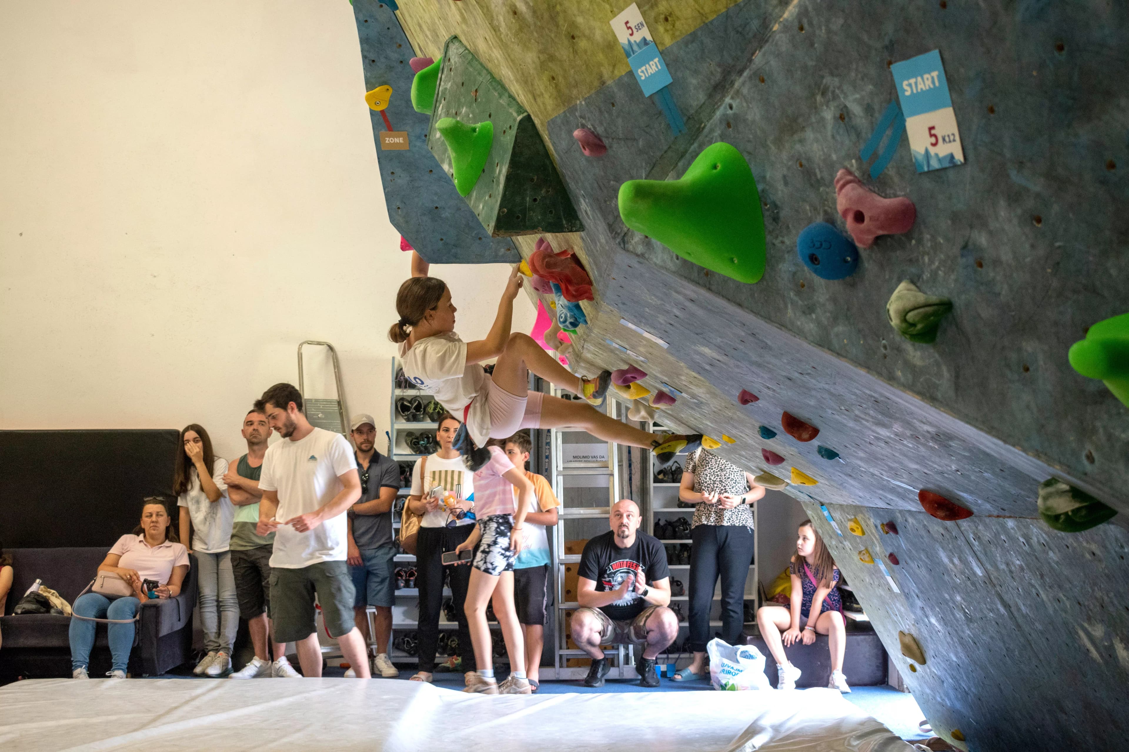 Climbers watching others on the wall