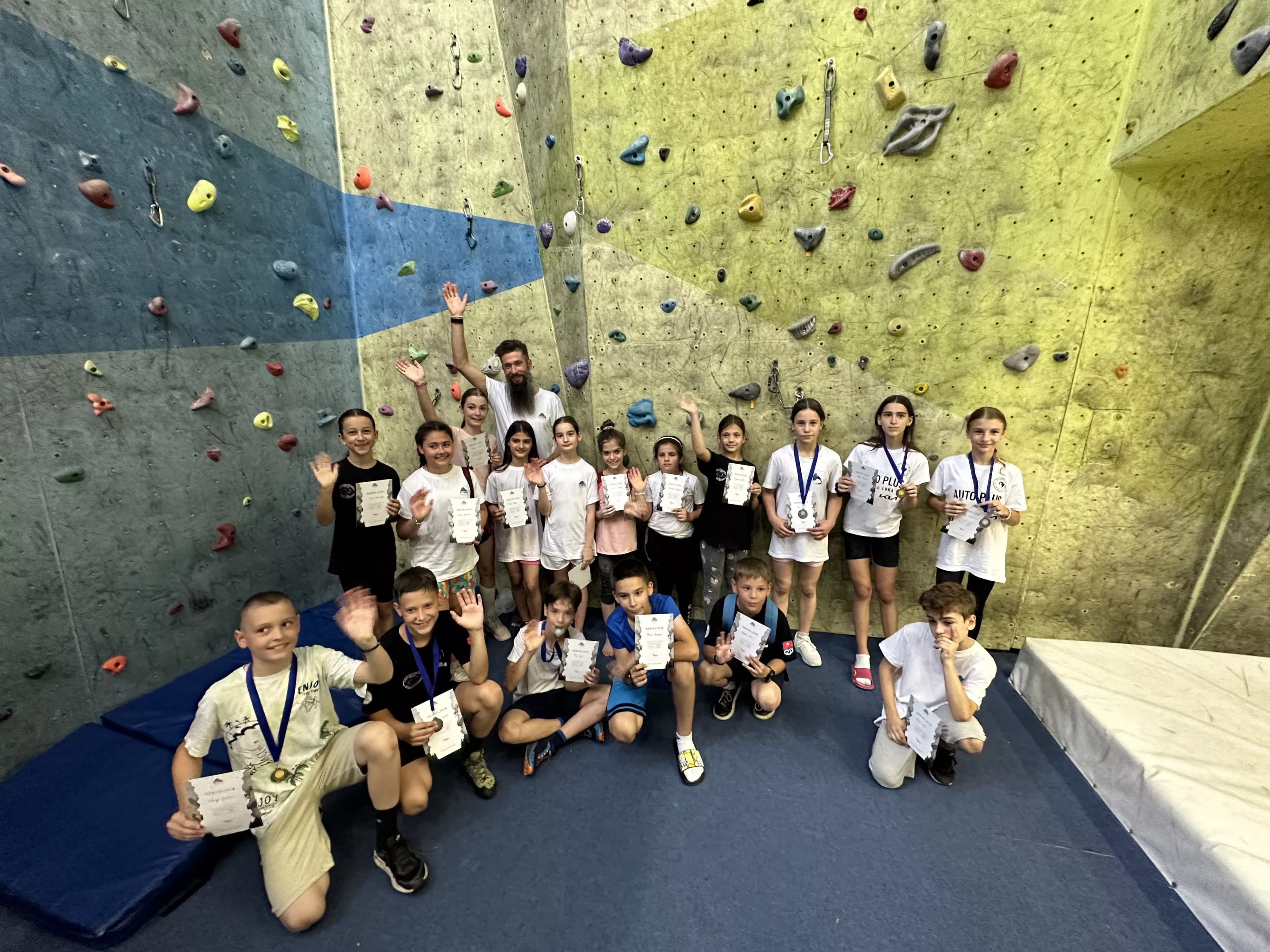 Group photo at climbing gym